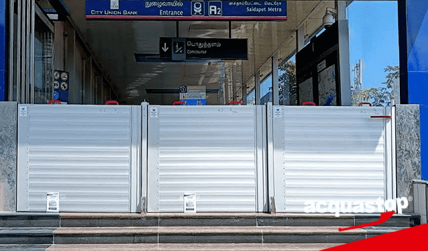 Modular flood barrier deployment at a commercial perimeter — deployment view 2
